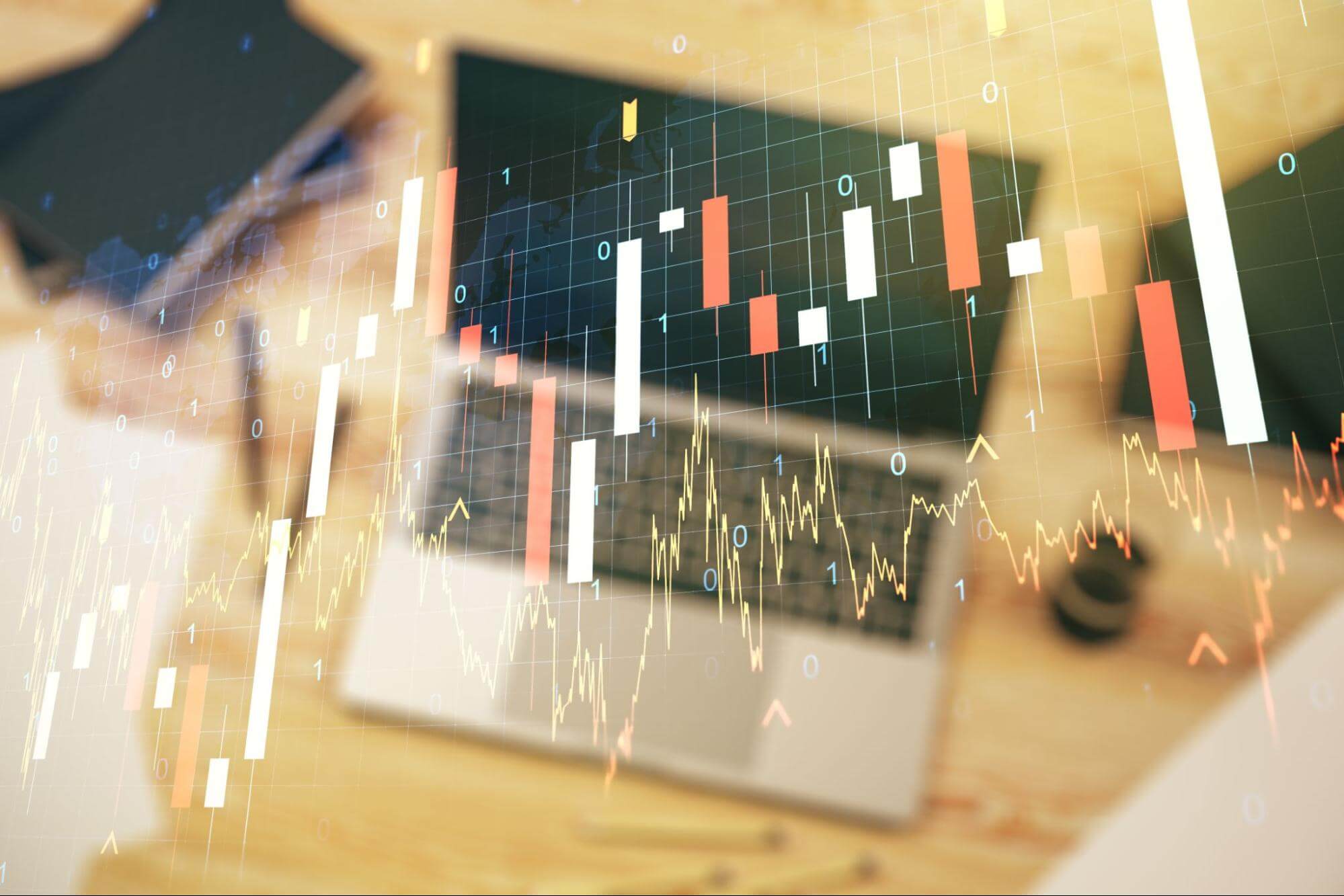 Image of trading price charts overlaid on an image of a laptop, meant to illustrate index mechanics